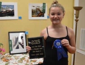 Dezarae Thibodeaux, 11, earned first place youth photo and the Robert Pastorella Sr. Memorial Award for her entry in the Groves Pecan Festival Photo/Art Contest. Mary Meaux/The News