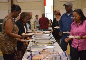 Attendees of the Salvation Army Volunteer Appreciation Luncheon move through the buffet line. Mary Meaux/The News 