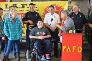 Port Arthur Mayor Deloris “Bobbie” Prince, right, speaks with Alexis Delome, far left, and Dylan Hall during a kick-off event for Port Arthur Professional Fire Fighters Association Local 397 and the Muscular Dystrophy Association’s Annual Fill the Boot Campaign at Fire Station 1 on Thursday. Mary Meaux/The News 