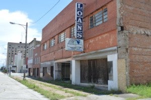 A group of buildings in the 400 block of Procter Street are set for demolition. Mary Meaux/The News