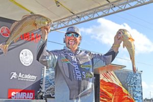 Freddy Frederick holds his third place catch in both hands. Lorenzo Salinas/The News