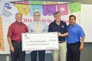 Vice President and GM of Valero PA Greg Gentry (left) presents a check to YMCA's (from left): President William “Bud” Oliver, Vice Chair Todd Lopez and Chairman Richard Gaona. (Lorenzo Salinas/The News)