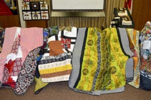 Some Casmore’s quilts are laid out for display. Lorenzo Salinas/The News