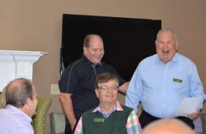 Kenny Blanda, executive director of Magnolia Manor, left, and Groves Chamber of Commerce and Tourist Center Parliamentarian Gene Venable, right, share a laugh during the chamber’s annual breakfast on Tuesday. Mary Meaux/The News