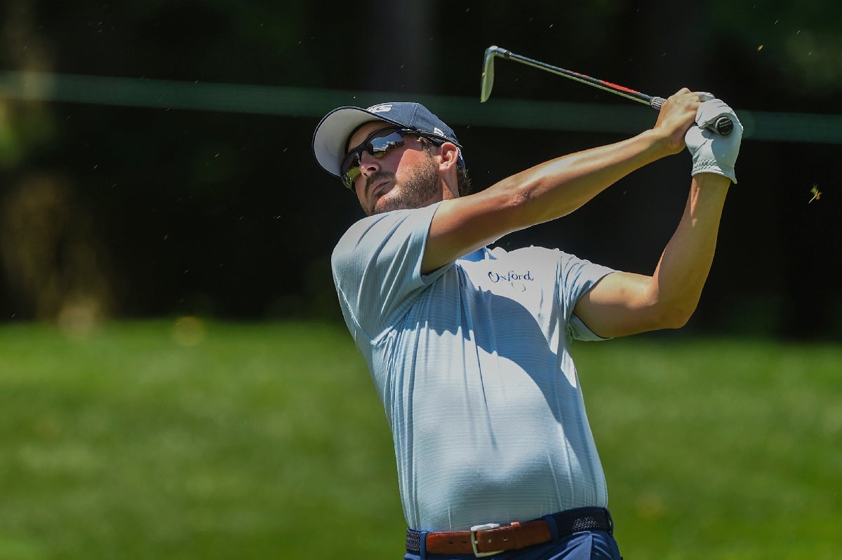 GOLF: Landry goes 63, ties Spaun for lead at Quicken Loans National ...