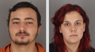 Cole Schroeder, left, and Carley Fowler were arrested Tuesday in connection with Monday's armed robbery of a Citgo gas station in Nederland.